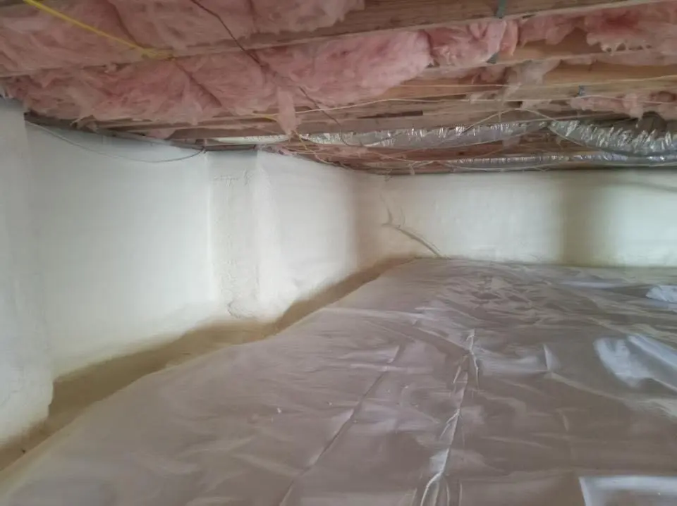 Crawl space encapsulation with closed-cell spray foam for Commercial Roof Restoration in Edwards